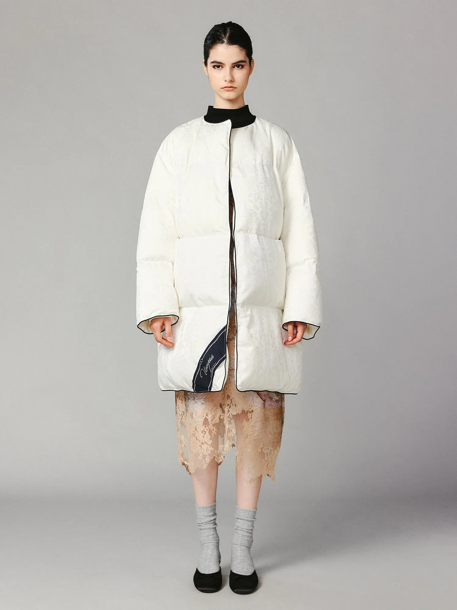 Duvet-inspired puffer coat